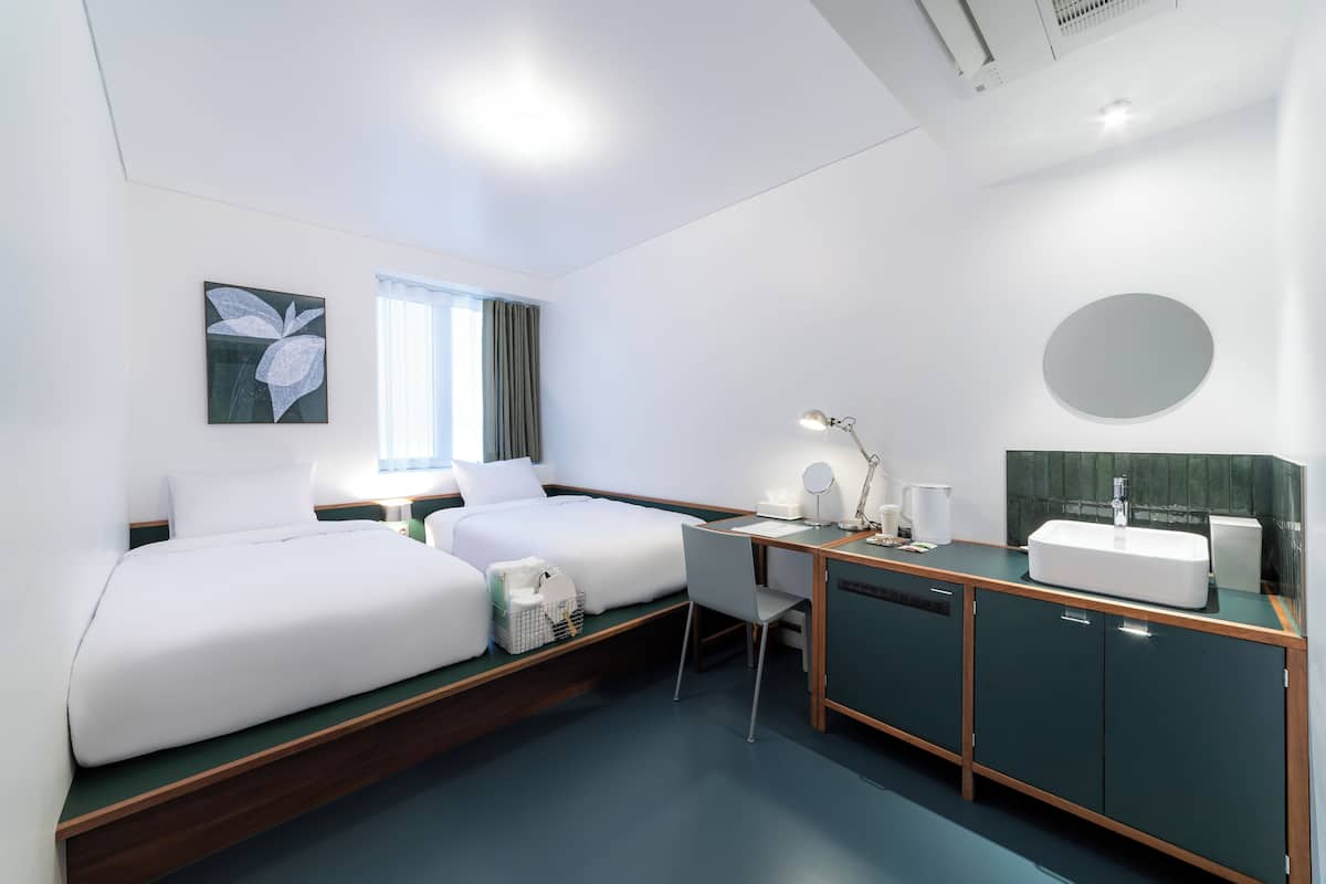 Superior Twin Room, Multiple Beds, City View | Individually decorated, individually furnished, desk, blackout drapes