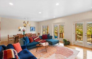 Smart TV, fireplace, books, printers