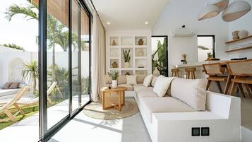 Deluxe-Villa, Poolblick | Wohnbereich