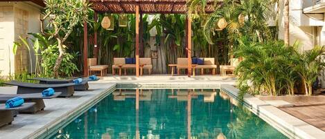 Outdoor pool, pool umbrellas, pool loungers