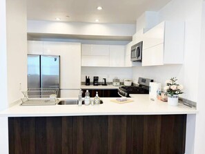 Private kitchen - Modern & Bright 2BR Retreat/Prime Location

Share

Save (Long Beach)