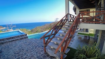3 outdoor pools, open 10:00 AM to 10:00 PM, pool umbrellas