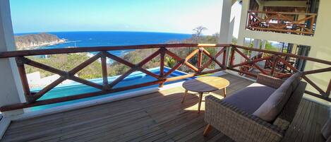 Suite básica, vista al mar | Terraza o patio