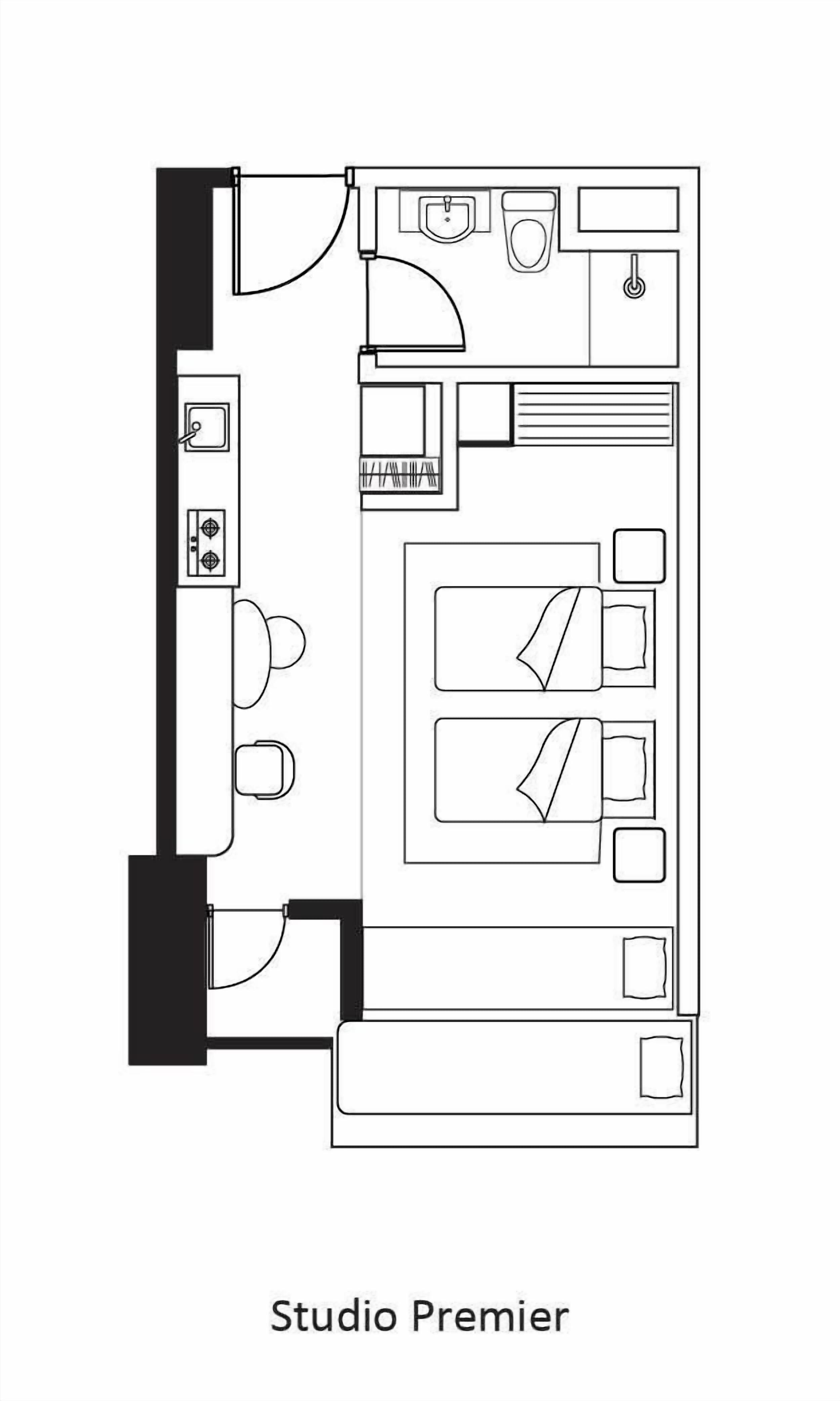 Plano de planta de un apartamento tipo estudio denominado 'Studio Premier', con kitchenette, baño, comedor y sala de estar.