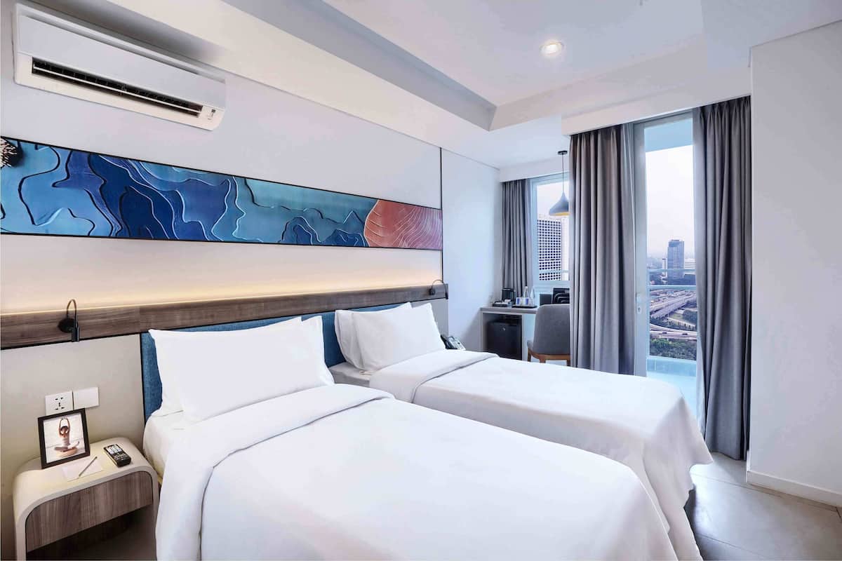 Habitación Deluxe con 2 camas individuales | Ropa de cama