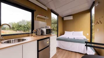 Fridge, microwave, stovetop, coffee/tea maker