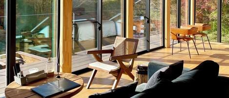 Luxury Villa, River View | Living area | Flat-screen TV