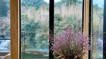 Luxury Villa, River View | Living area | Flat-screen TV