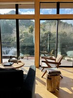 Luxury Villa, River View | Living area | Flat-screen TV