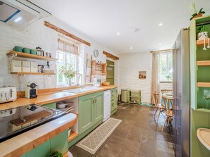 Astianpesukone, syöttötuoli