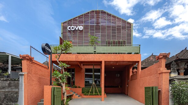 A building with a sign reading "Cove" and a covered entrance. - Cove The Cave (Denpasar)