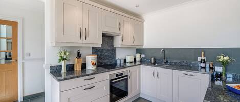 Lavavajillas y periquera