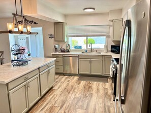Fridge, microwave, oven, stovetop - The George Retreat; Desert-Chic 4BR Retreat + Private Pool + Curated Style (Tempe)