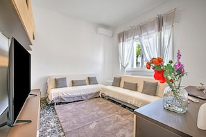Standard House, Multiple Bedrooms (La Siesta) | Living area | 21-inch Smart TV with digital channels