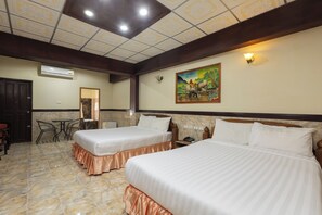 Deluxe Quadruple Room, 2 Queen Beds, Balcony