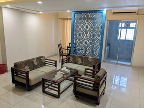 Studio Deluxe, balcon, vue ville | Coin séjour