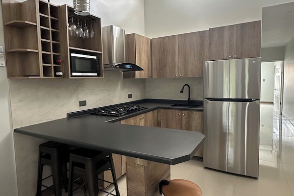 Fridge, microwave, coffee/tea maker, toaster