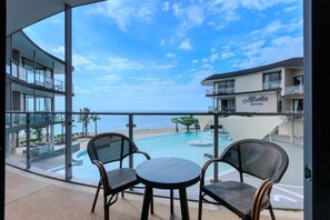 Outdoor pool, open 8:00 AM to 11:00 PM, sun loungers