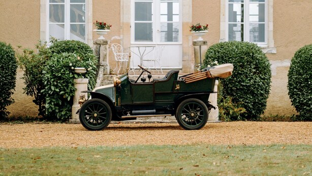 A vintage car parked in front of a building with multiple windows and a central entrance. - Live the Chateau Dream in the Loire Countryside (Bazouges-sur-le-Loir)