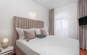 1 chambre, fer et planche à repasser, Wi-Fi gratuit, draps fournis
