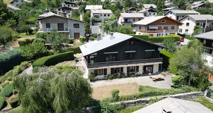 Welcoming chalet for 10/12 people in a quiet area close to the town center
