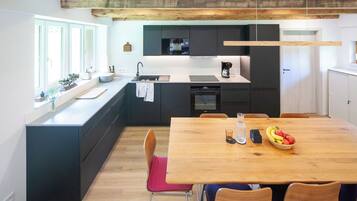 Coffee/tea maker, fridge, microwave, oven