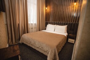 Standaard tweepersoonskamer | Geluiddichte muren, een strijkplank/strijkijzer, gratis wifi, beddengoed