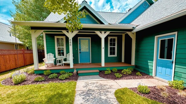 A two-story house with a covered porch, a front door, and a mailbox. - Cozy 3BR/2BA Family Retreat in Driggs (Driggs)