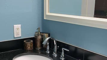 Combined shower/tub, hair dryer, towels, soap