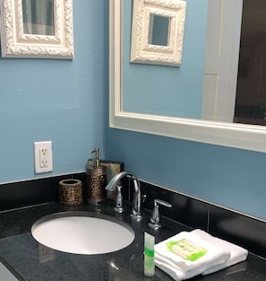Combined shower/bathtub, hair dryer, towels, soap