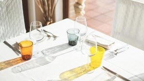 A dining table set with cutlery and glasses, a napkin, and a menu. - Miraconero (Porto Recanati)