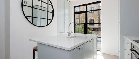 Fridge, microwave, toaster, cookware/dishes/utensils