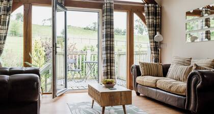 Section of luxury renovated barn with a large hot tub. Sleeping 5
