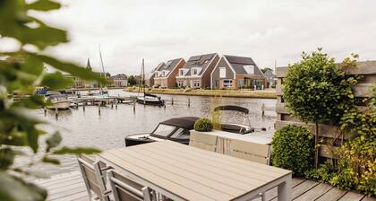 Charming stay where the boats glide by.
