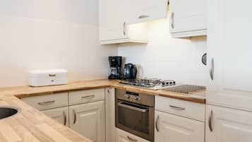 Fridge, microwave, dishwasher, coffee/tea maker