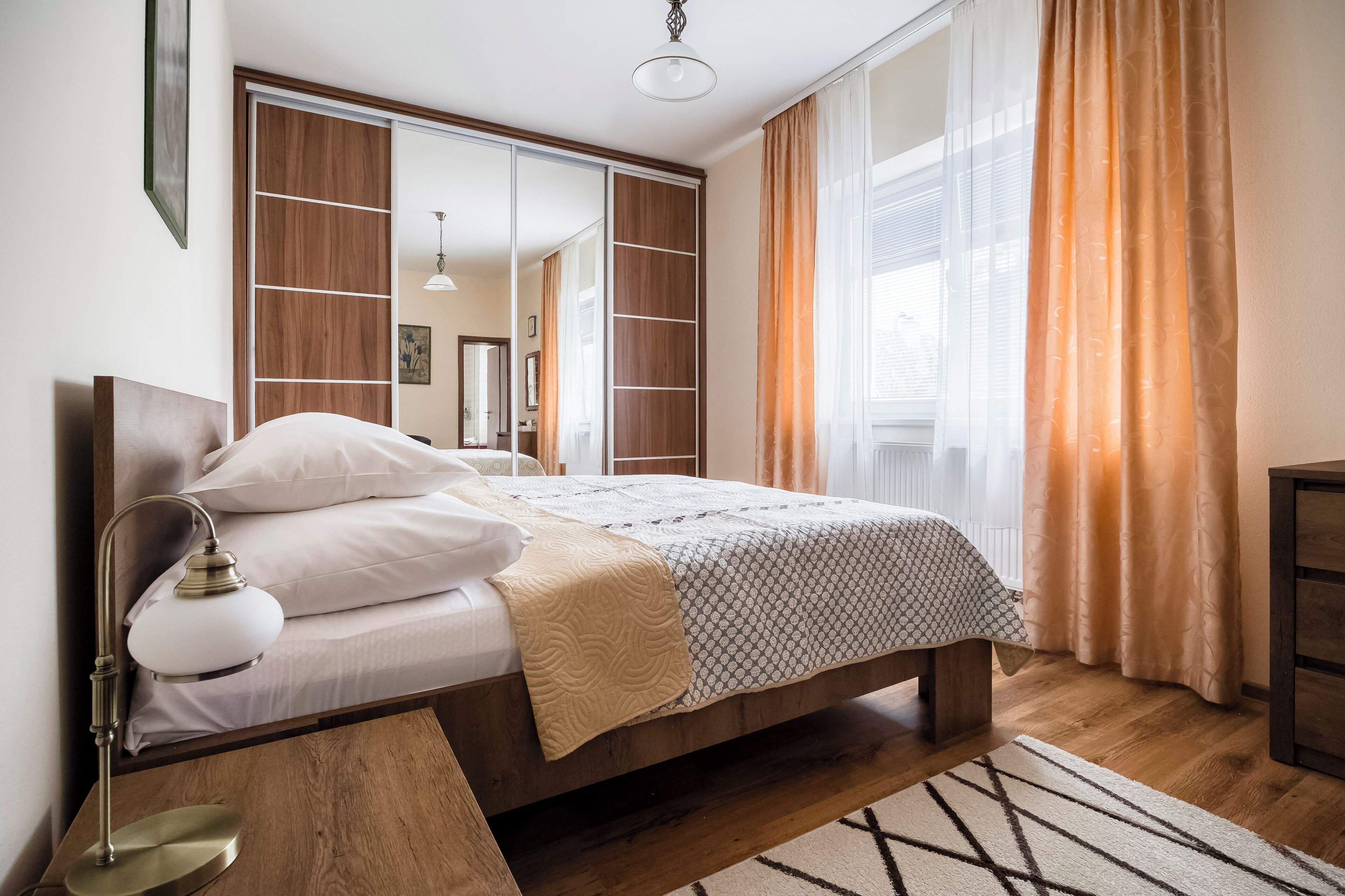 Deluxe Apartment, Balcony, Park View | In-room safe, laptop workspace, blackout drapes, soundproofing