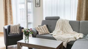 Deluxe Apartment, Balcony, Park View | In-room safe, laptop workspace, blackout drapes, soundproofing