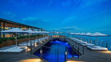 2 outdoor pools, pool umbrellas, pool loungers