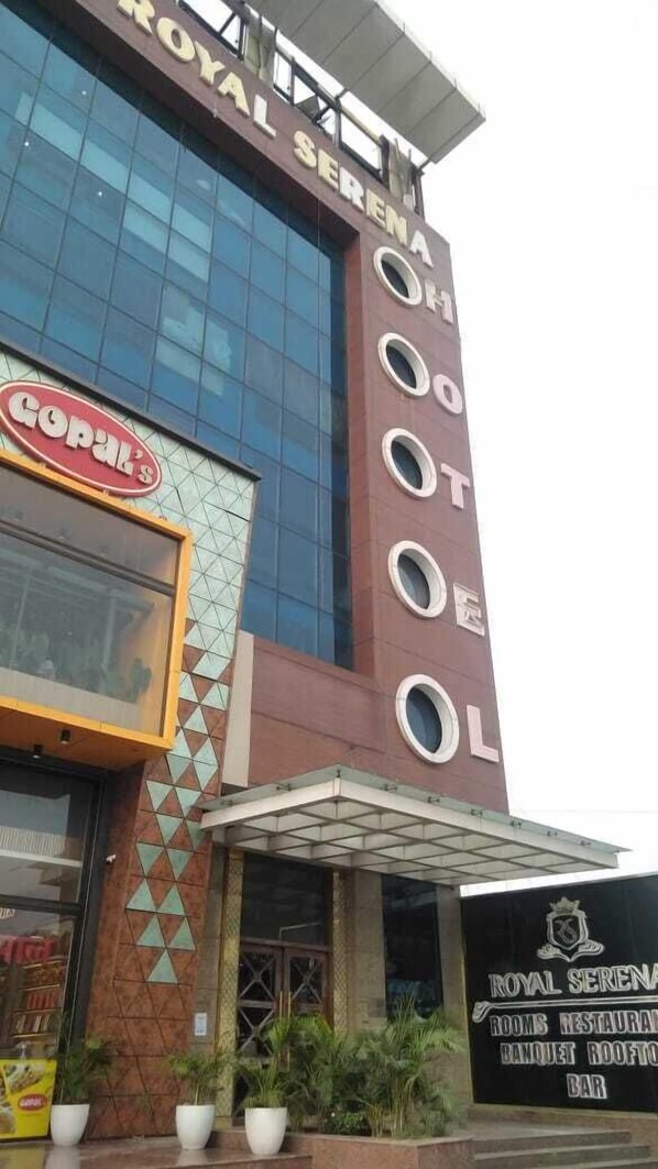 A building with a sign for "Royal Sereno" and "Copa's" on the facade. - The Altruist Ambala Hotel (Ambala)