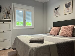 2 habitaciones, tabla de planchar con plancha y wifi gratis