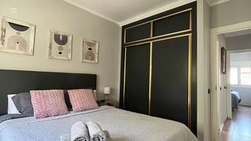 2 slaapkamers, een strijkplank/strijkijzer, gratis wifi, beddengoed