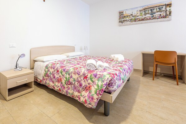 Habitación cuádruple, vista al patio | Wifi gratis 