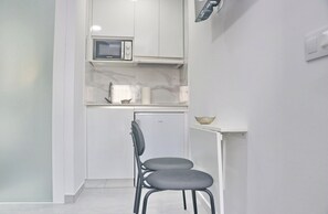 Fridge, microwave, coffee/tea maker, toaster