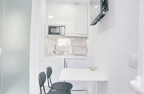 Fridge, microwave, coffee/tea maker, toaster