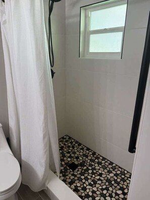 Shower, hair dryer, towels, shampoo - 3BR home w/ pool & BBQ grill (Satellite Beach)