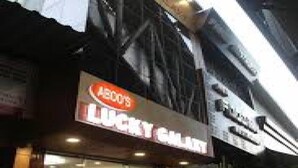 A storefront with a sign that reads "Lucky Salami." - Hotel Lucky Galaxy (Mumbai)