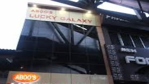 A building with signage for 'ABOO'S LUCKY GALAXY'. - Hotel Lucky Galaxy (Mumbai)