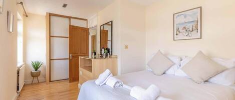 4 bedrooms, iron/ironing board, travel cot, WiFi