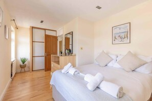 Iron/ironing board, travel crib, WiFi, bed sheets