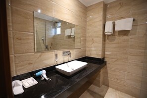 Shower, hydromassage showerhead, designer toiletries, hair dryer